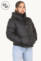 Model in Black Cropped Puffer Jacket with Hood