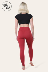 Back view of high waisted gym leggings in wine red colour