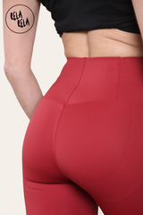 Detail shot of seamless stitching on wine red high waisted leggings