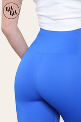 Detail shot of seamless stitching on royal blue bum shaping leggings