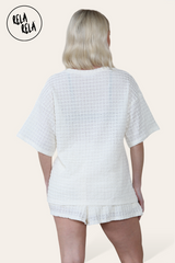 Back view of cream knitted co-ord set with T-shirt and shorts