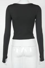 Long Sleeve Asymmetric Cutout Crop Top in Black